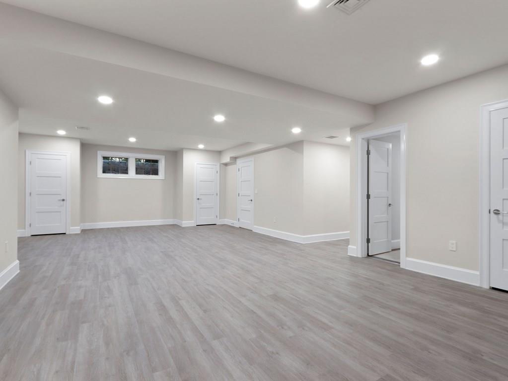 30 Columbine Road Newton, MA 02459 - Photo 29 of 35 a view of an empty room with wooden floor
