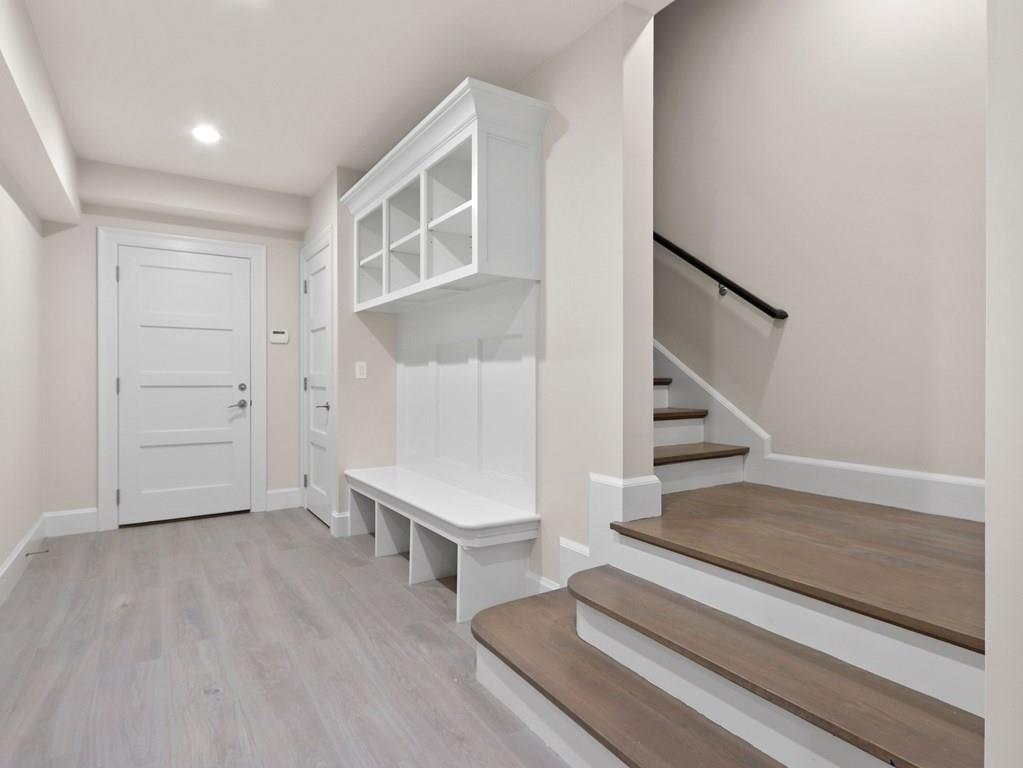 30 Columbine Road Newton, MA 02459 - Photo 30 of 35 a view of entryway and hall with wooden floor