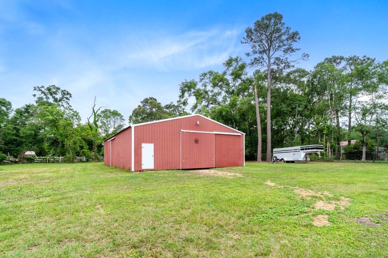 13180 Morgan Drive Splendora, TX 77372 - Photo 30 of 38 40x60 barn with stalls. Horse trailer does not convey with the home