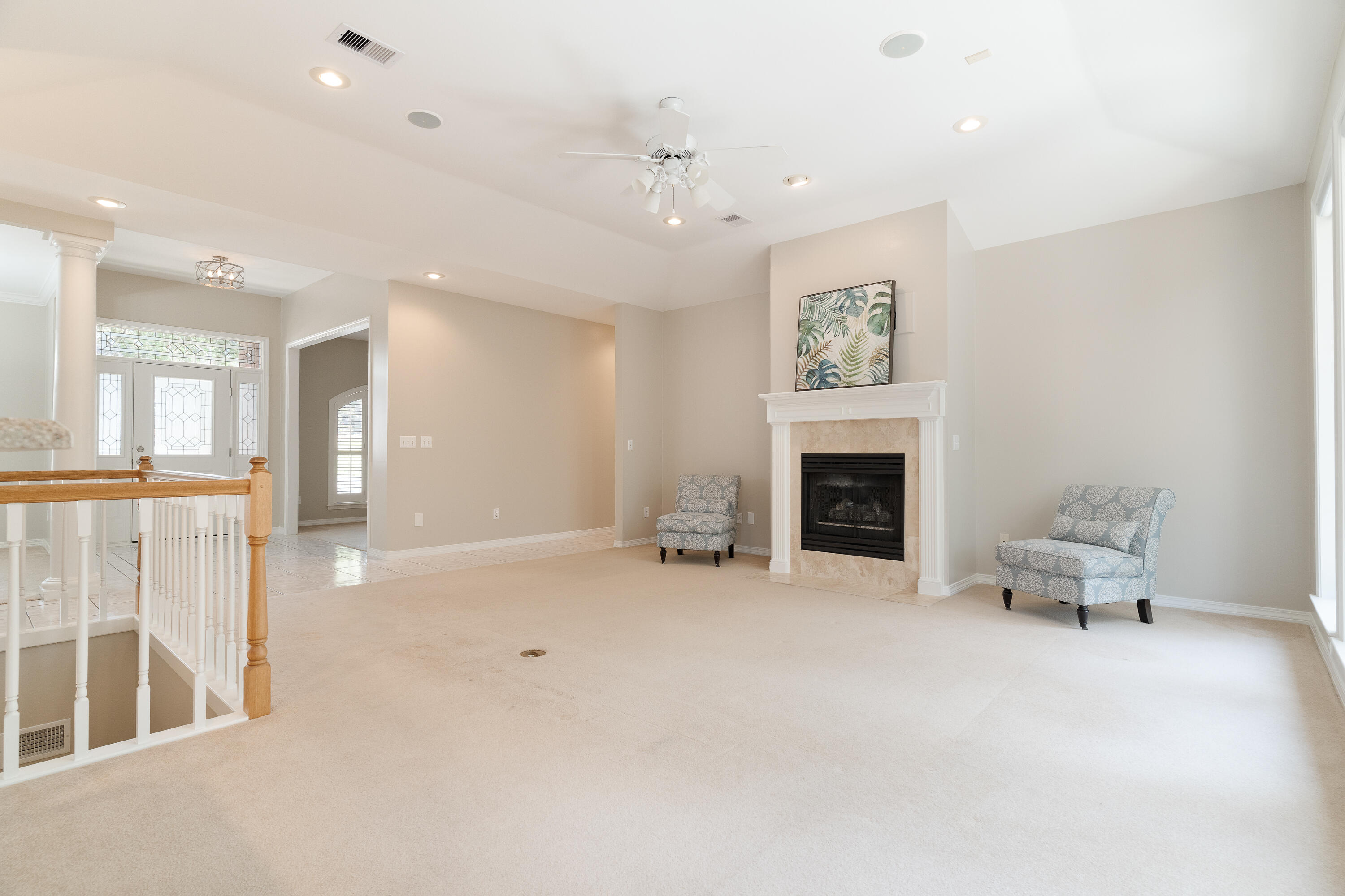 4100 Howard Drive Niceville, FL 32578 - Photo 10 of 133 a view of livingroom with furniture fireplace and workspace