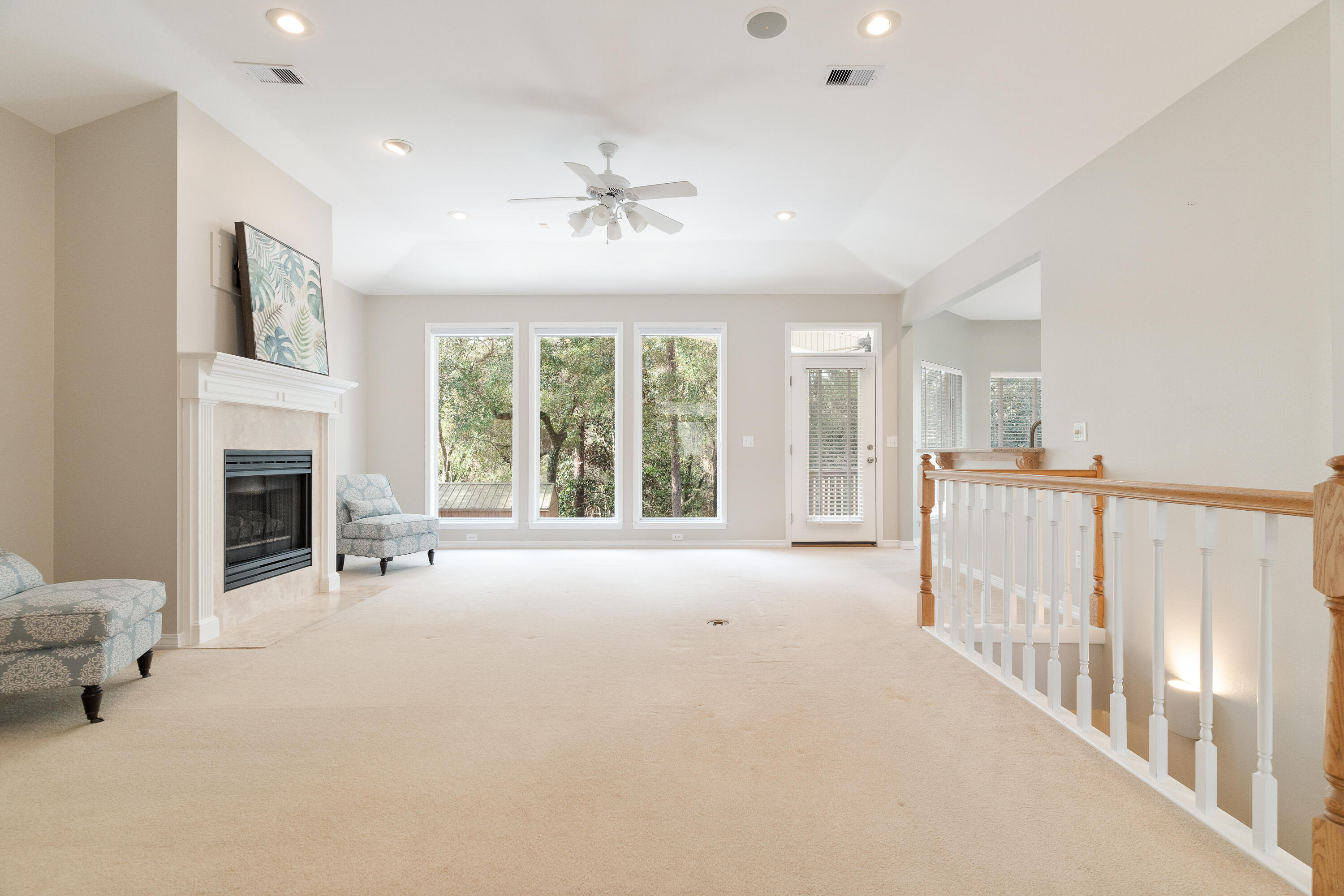 4100 Howard Drive Niceville, FL 32578 - Photo 11 of 133 a living room with furniture and a fireplace