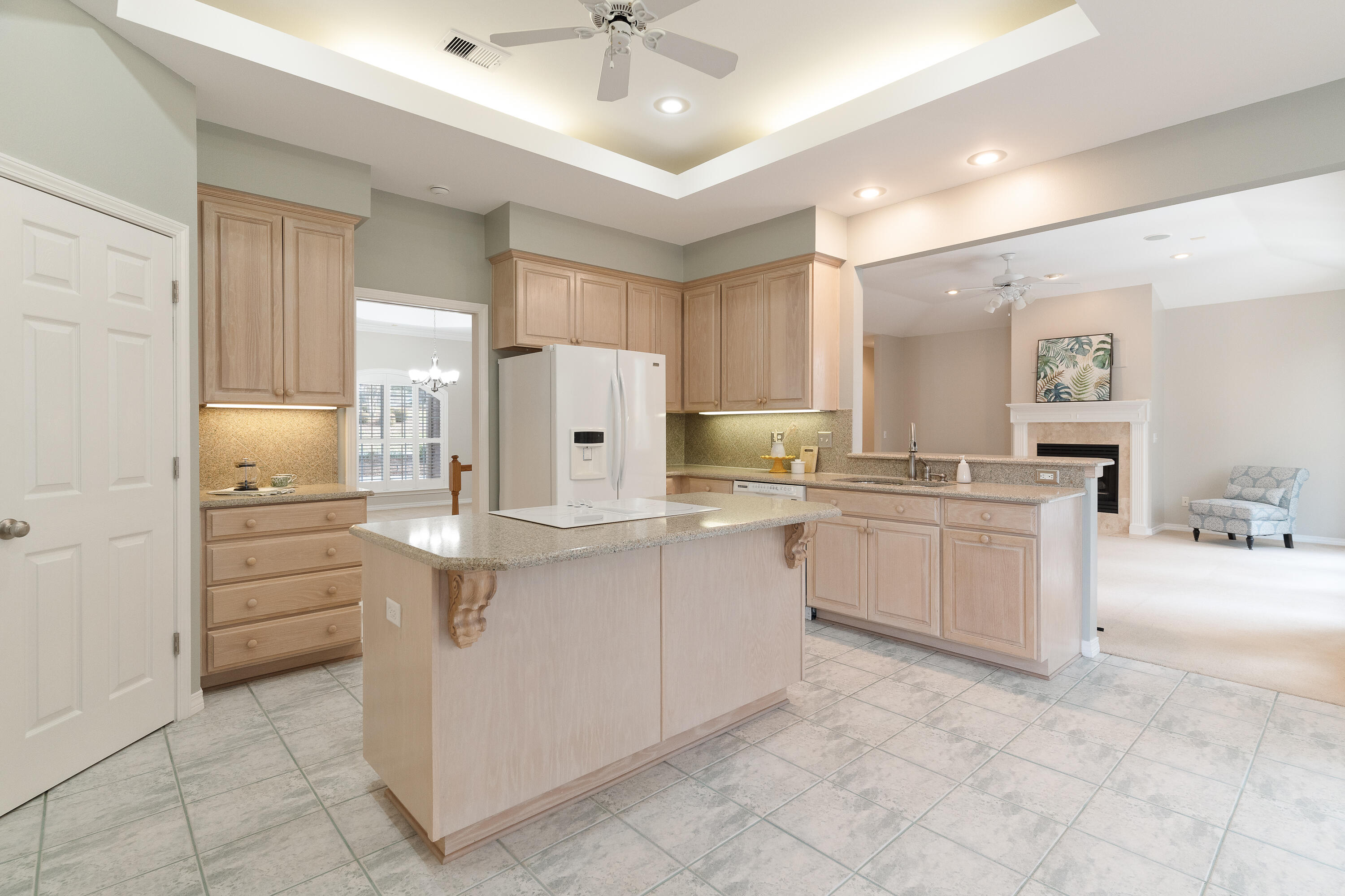 4100 Howard Drive Niceville, FL 32578 - Photo 30 of 133 a kitchen with white cabinets and white appliances