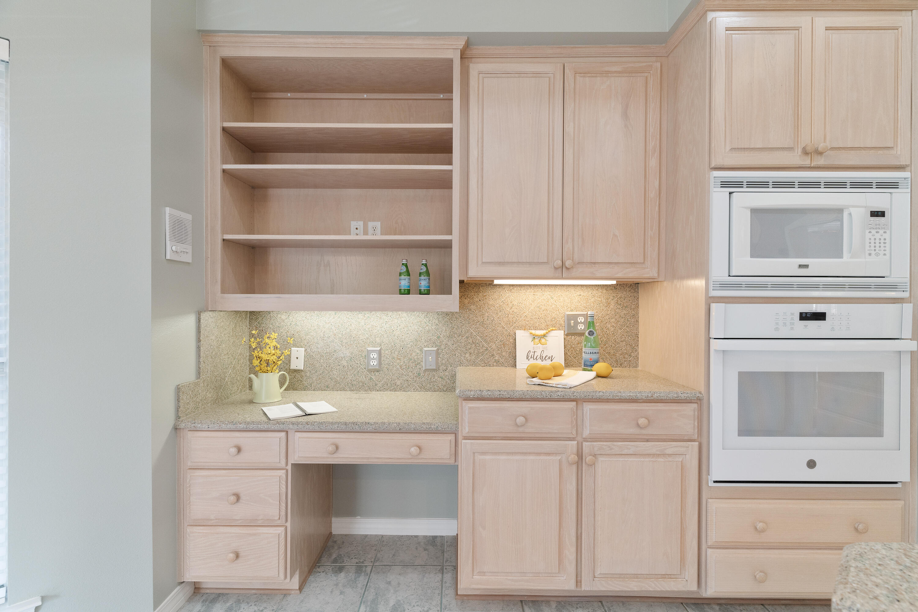 4100 Howard Drive Niceville, FL 32578 - Photo 34 of 133 a kitchen with white cabinets and sink
