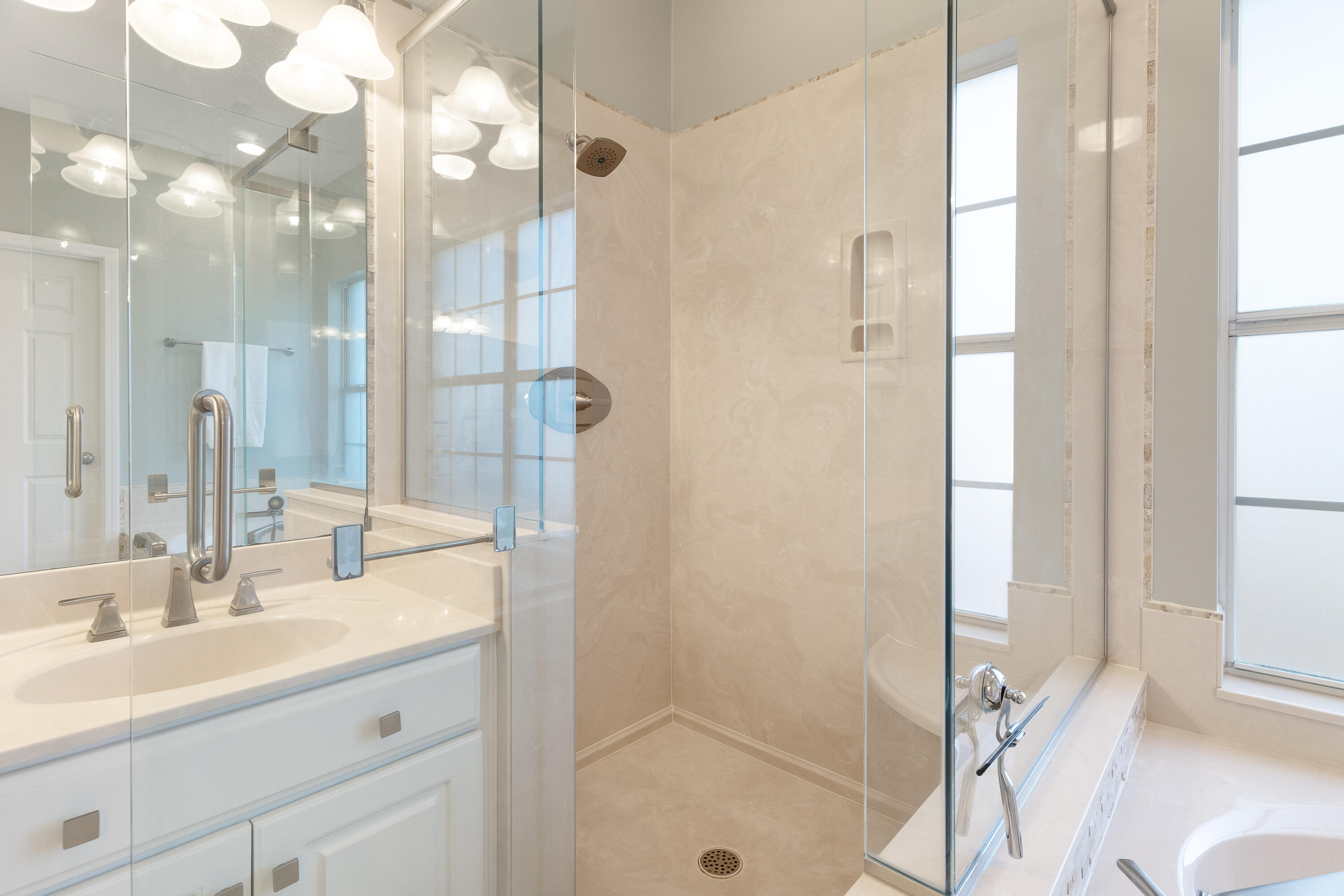 4100 Howard Drive Niceville, FL 32578 - Photo 52 of 133 a bathroom with a double vanity sink mirror and shower