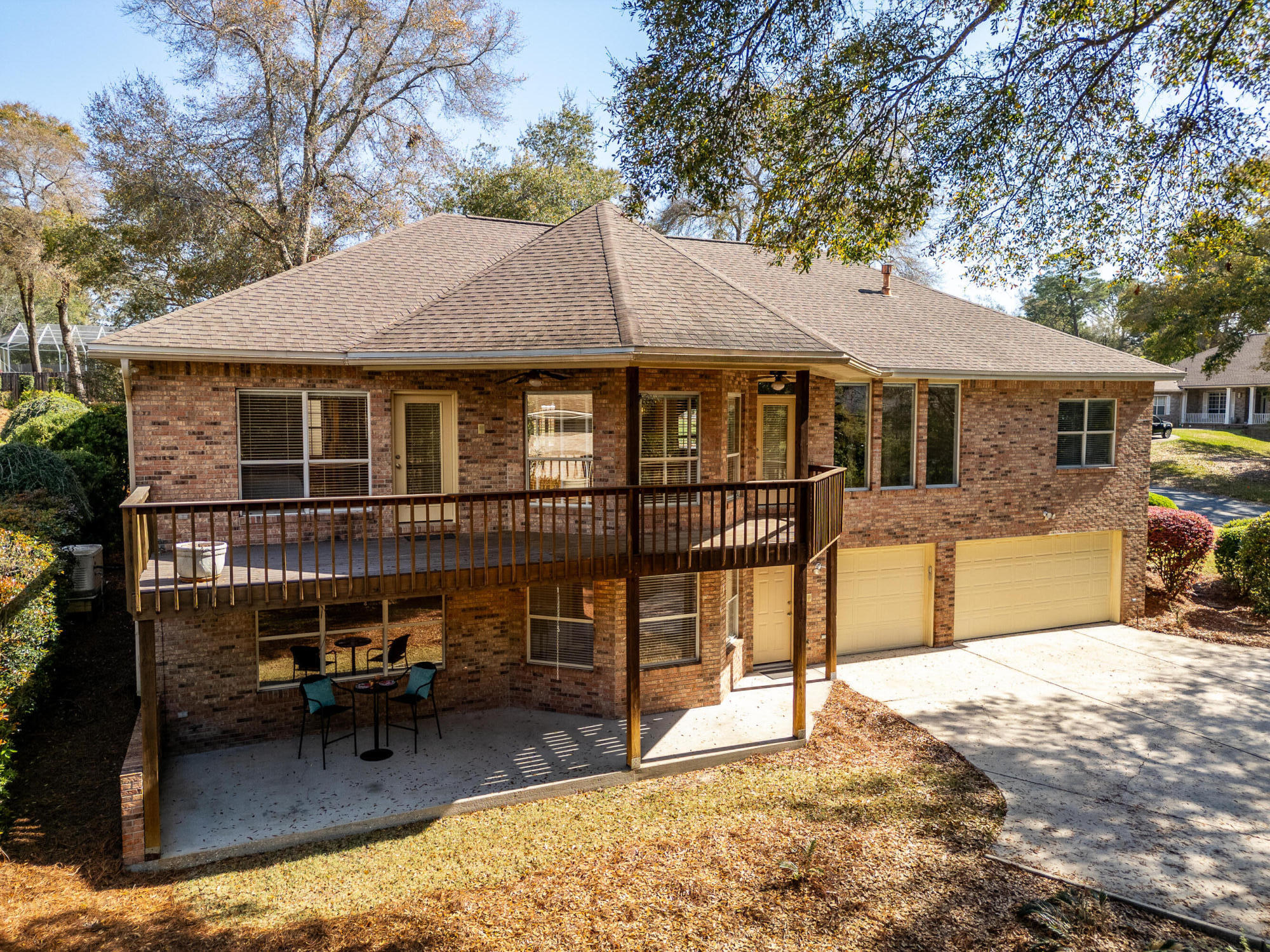 4100 Howard Drive Niceville, FL 32578 - Photo 6 of 133 a view of a house with swimming pool and sitting area