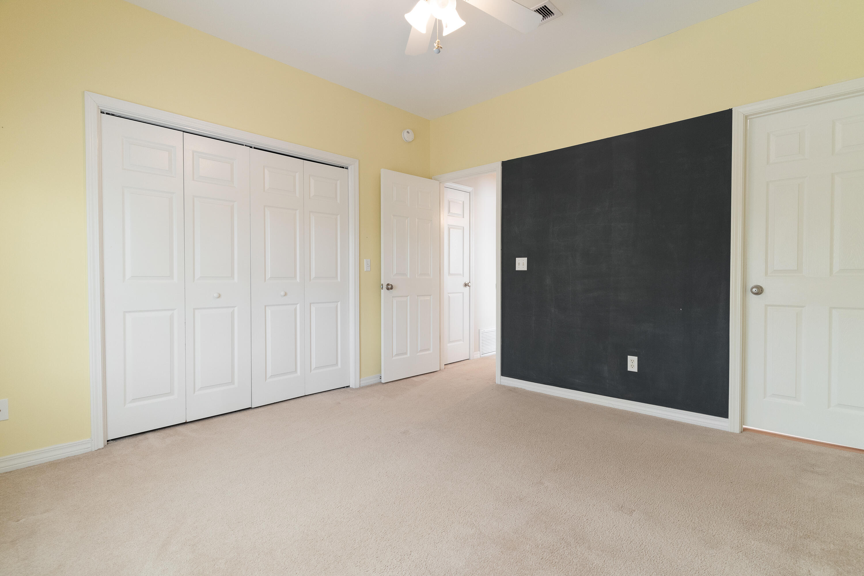 4100 Howard Drive Niceville, FL 32578 - Photo 62 of 133 a view of an empty room with a ceiling fan