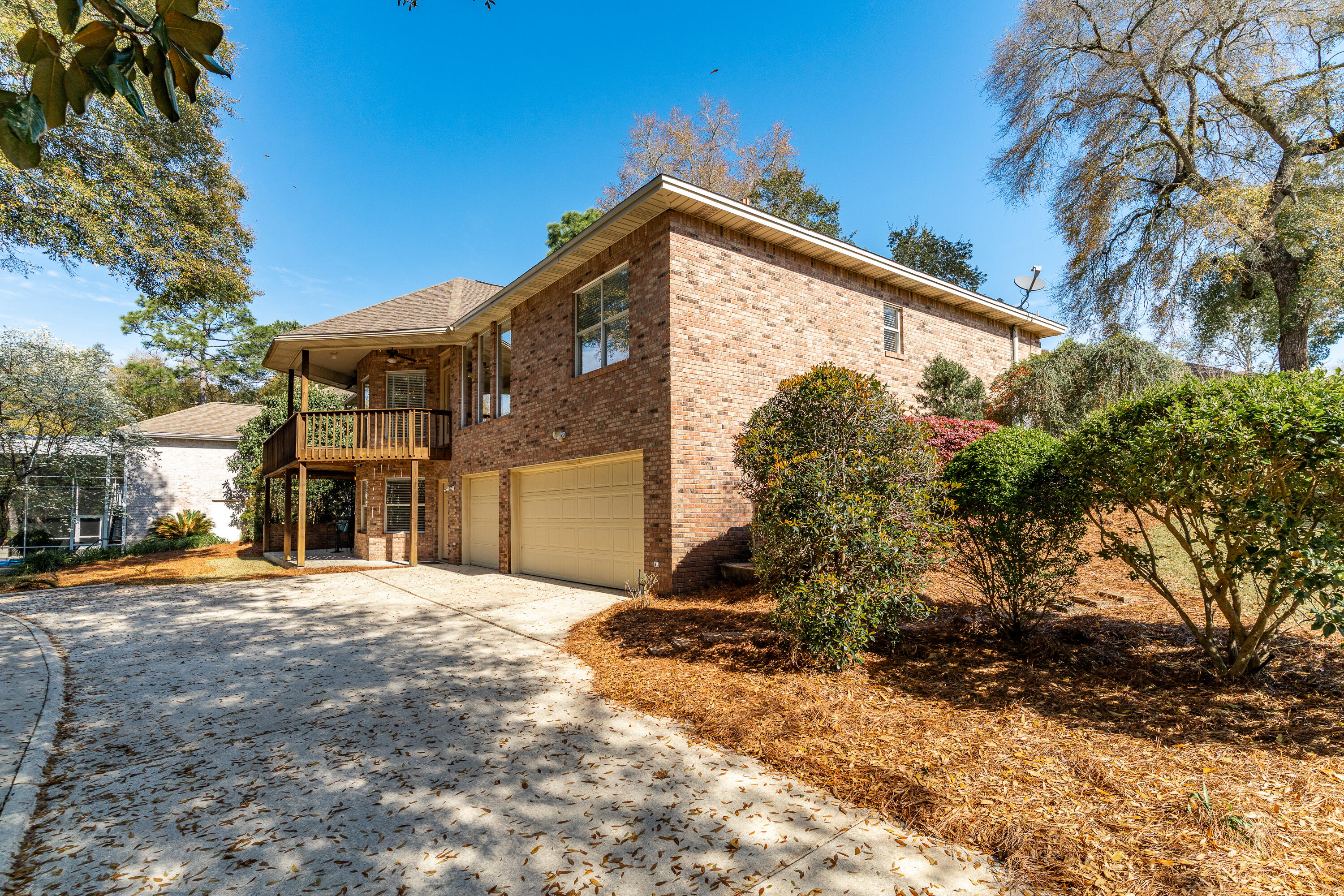 4100 Howard Drive Niceville, FL 32578 - Photo 7 of 133 a view of a house with a snow in the yard