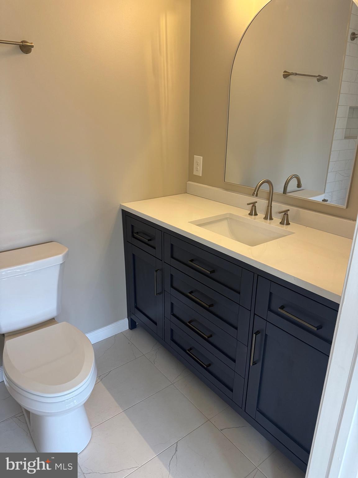 7 Orchard Alley Spring Spring City, PA 19475 - Photo 21 of 47 a bathroom with a toilet sink and mirror