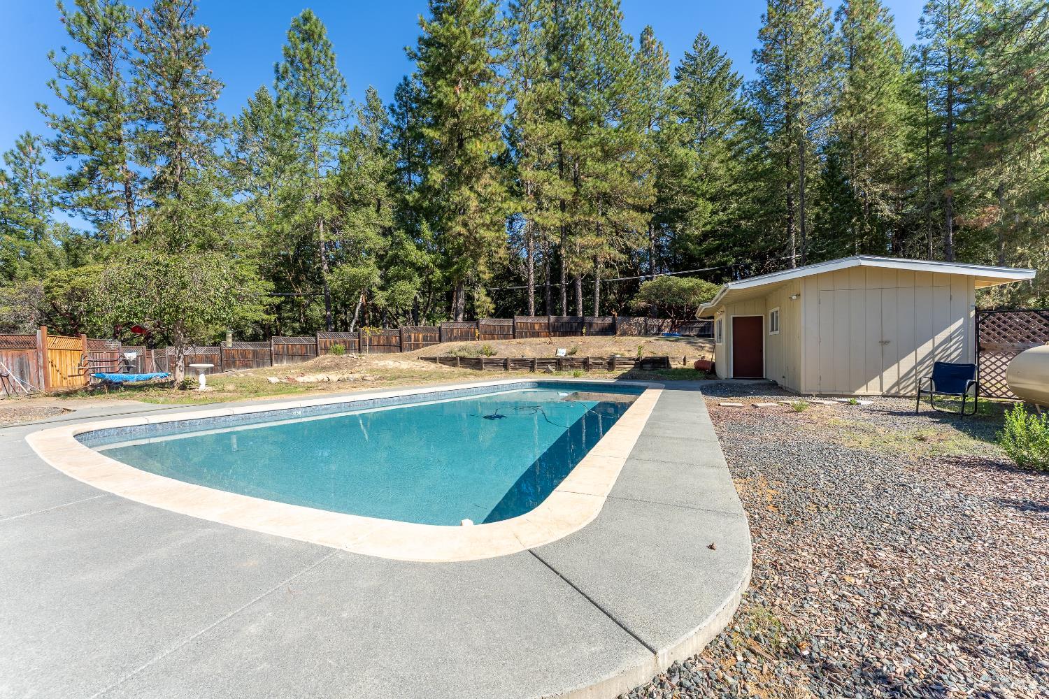 3651 Ridgewood Road Willits, CA 95490 - Photo 30 of 45 a view of a swimming pool with a patio