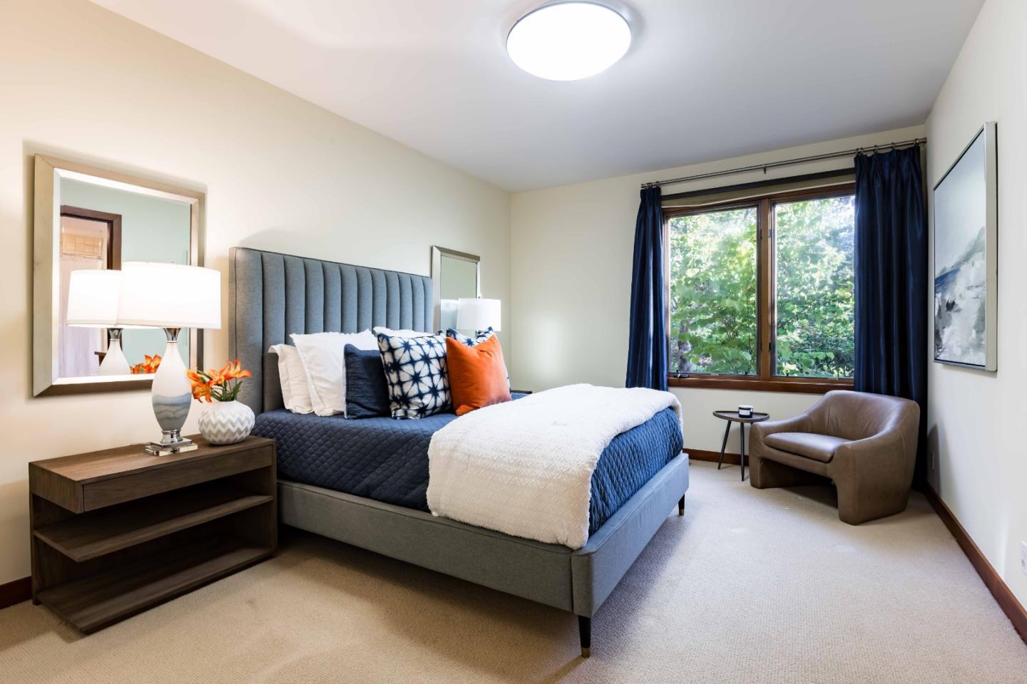 140 Farm Road Woodside, CA 94062 - Photo 13 of 39 a bed room with a bed and a couch