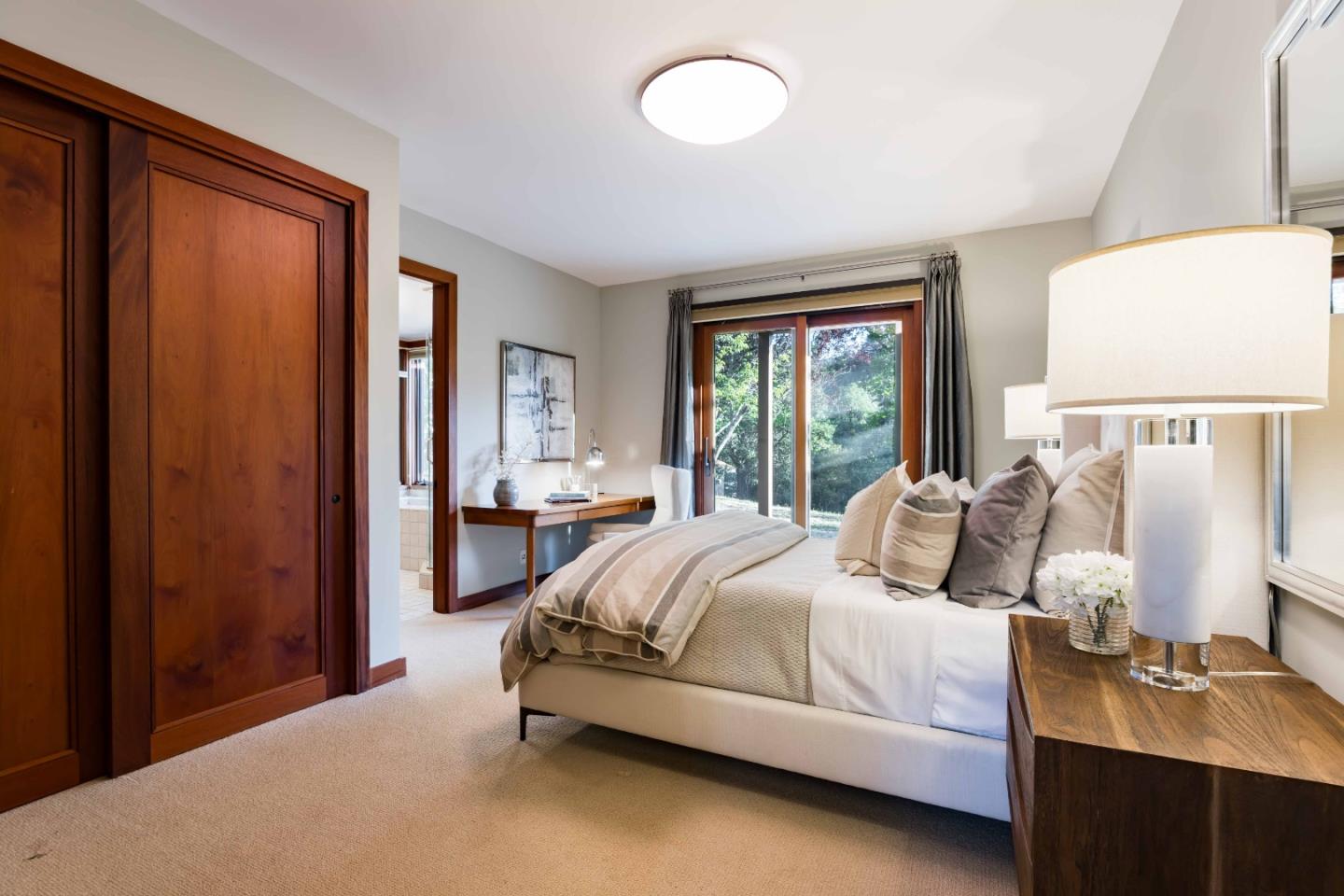 140 Farm Road Woodside, CA 94062 - Photo 15 of 39 a bedroom with a bed and window