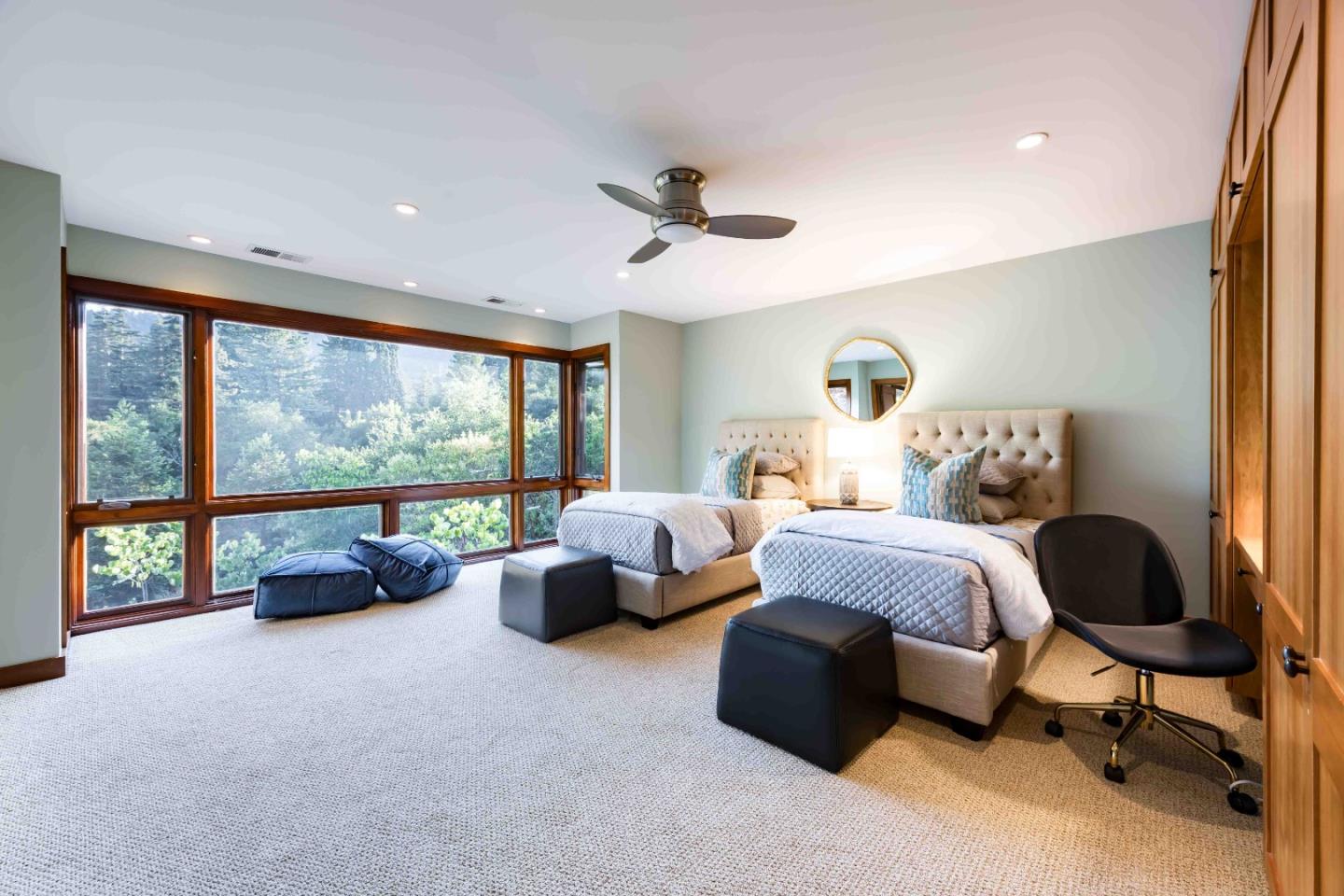 140 Farm Road Woodside, CA 94062 - Photo 19 of 39 a bedroom with furniture and a large window