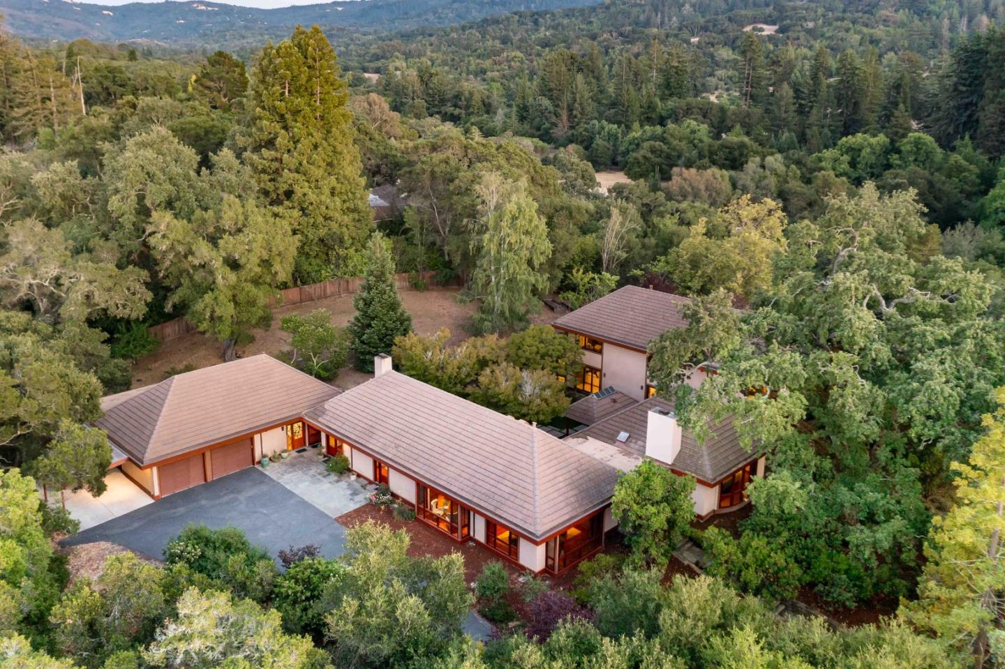 140 Farm Road Woodside, CA 94062 - Photo 2 of 39 an aerial view of a house with a garden