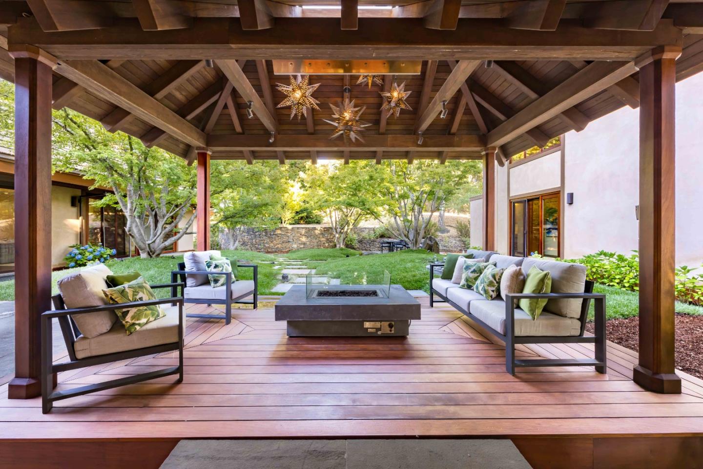 140 Farm Road Woodside, CA 94062 - Photo 27 of 39 a living room with patio furniture and a floor to ceiling window