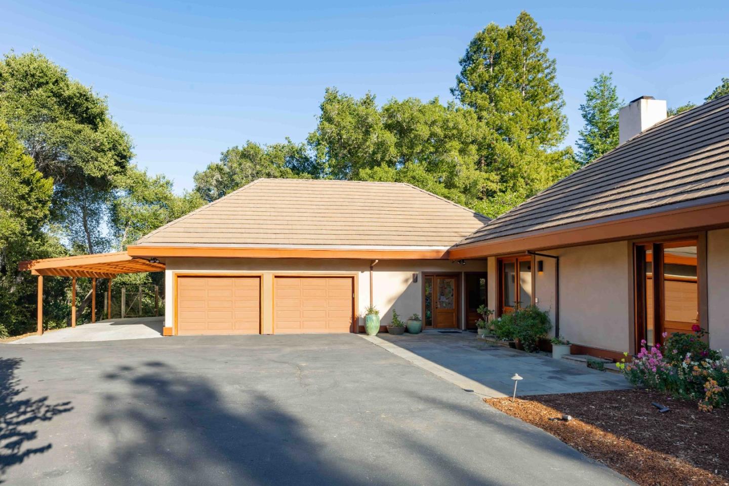 140 Farm Road Woodside, CA 94062 - Photo 34 of 39 a front view of a house with a yard