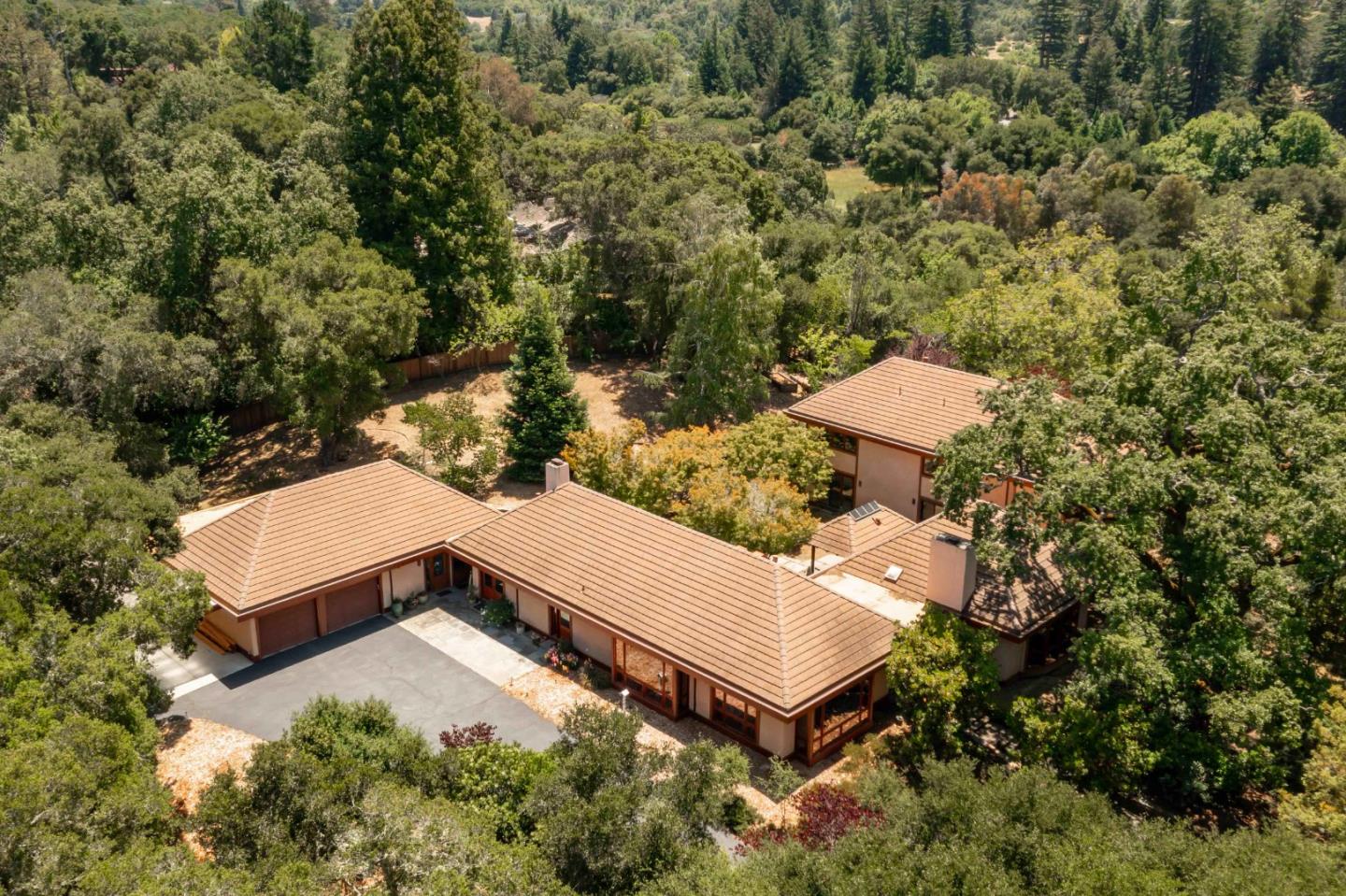 140 Farm Road Woodside, CA 94062 - Photo 39 of 39 an aerial view of a house with a yard