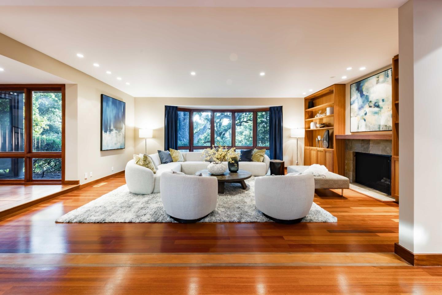 140 Farm Road Woodside, CA 94062 - Photo 5 of 39 a living room with fireplace furniture and a large window