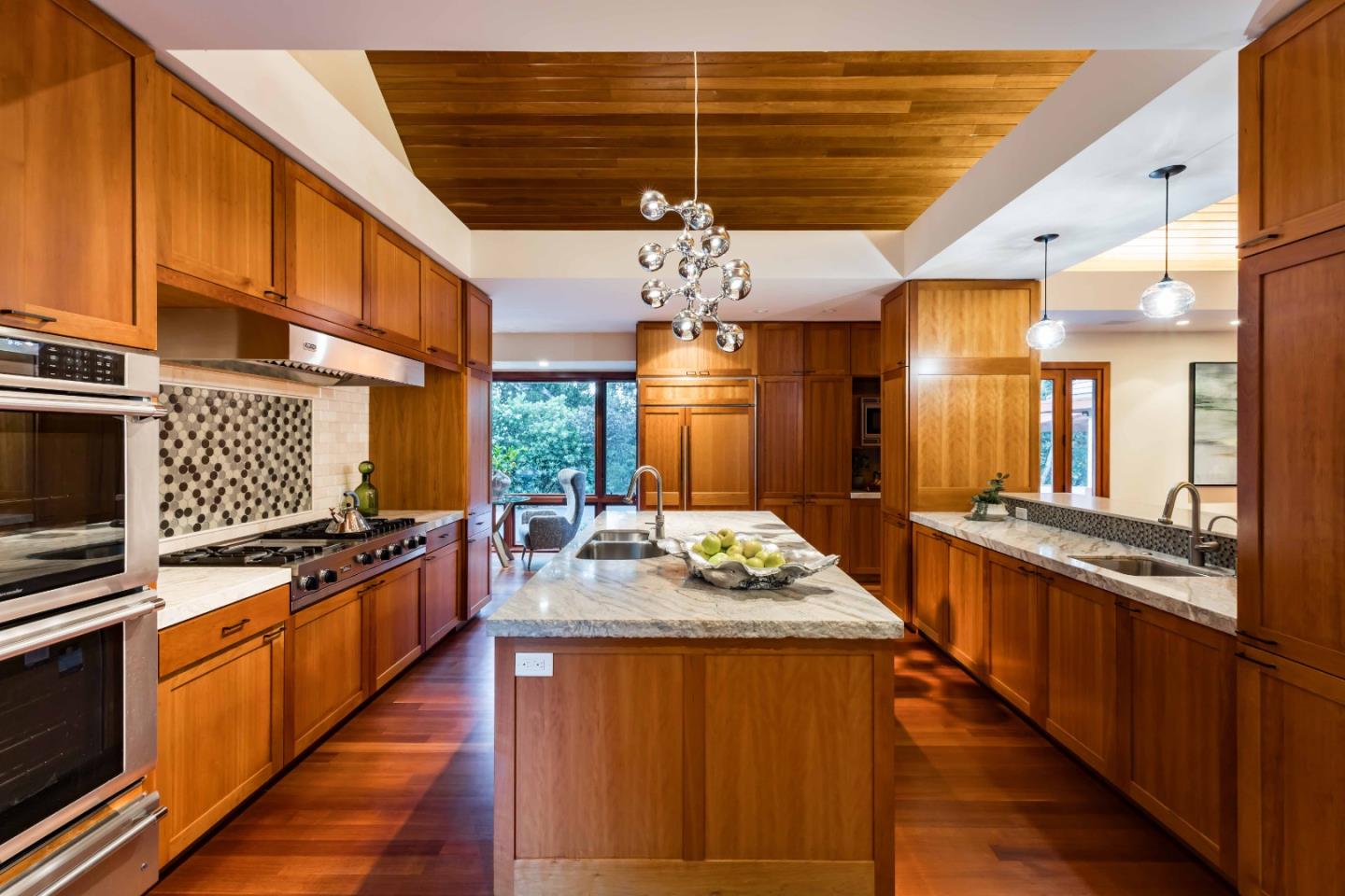 140 Farm Road Woodside, CA 94062 - Photo 8 of 39 a kitchen with stainless steel appliances granite countertop a stove and cabinets