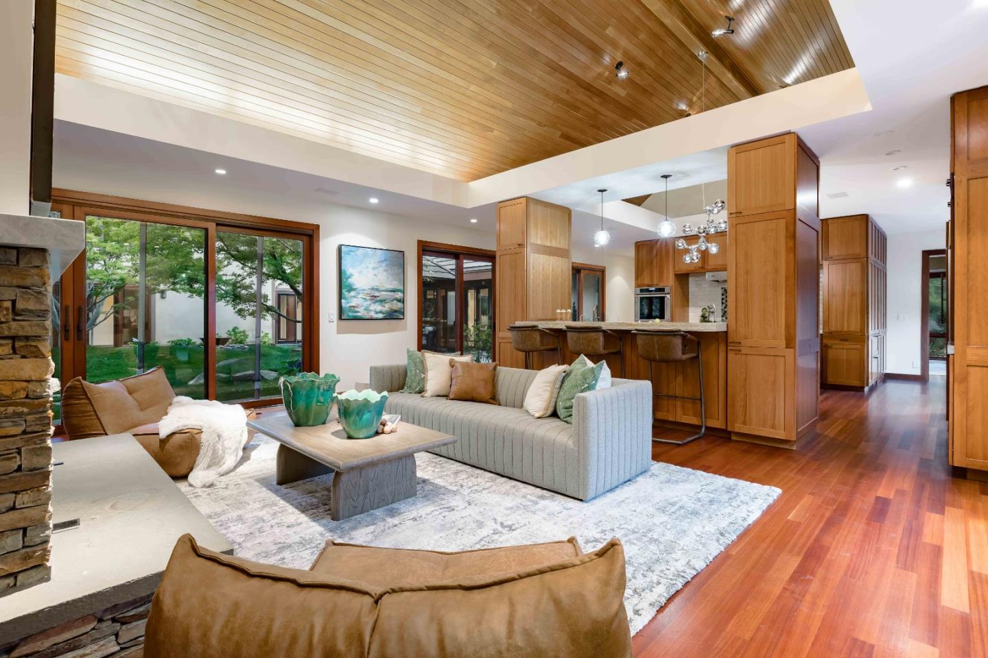 140 Farm Road Woodside, CA 94062 - Photo 9 of 39 a living room with furniture and a wooden floor