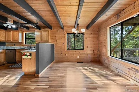 a view of entryway with wooden floor