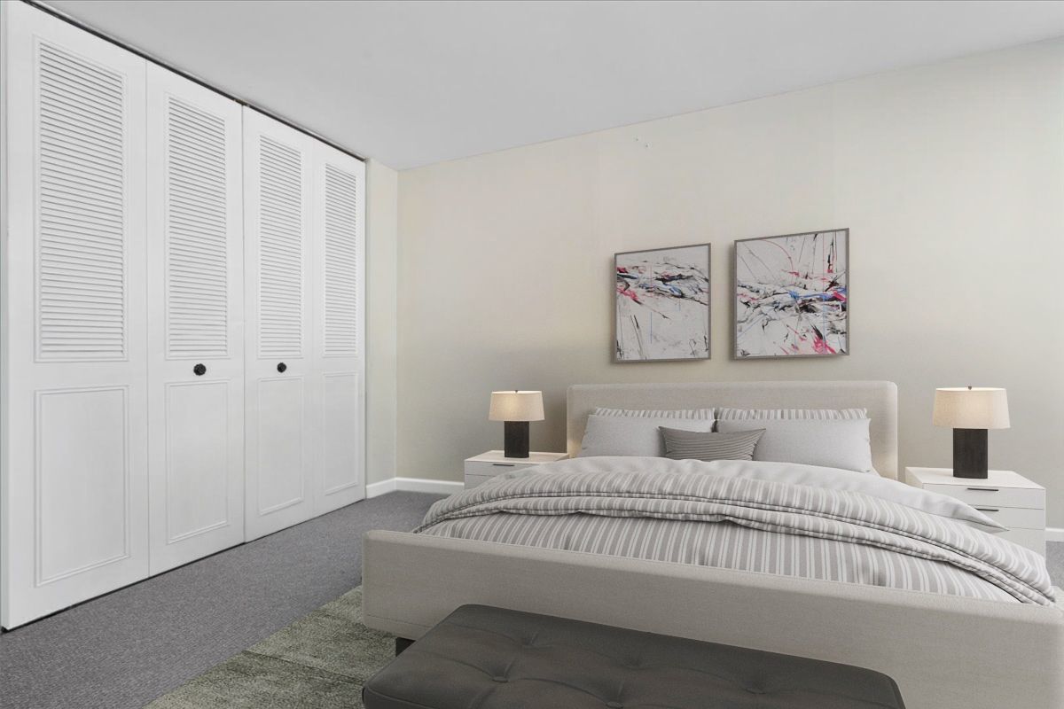 6171 North Sheridan Road, Unit 1112 Chicago, IL 60660 - Photo 13 of 23 a bedroom with a bed and a painting on the wall