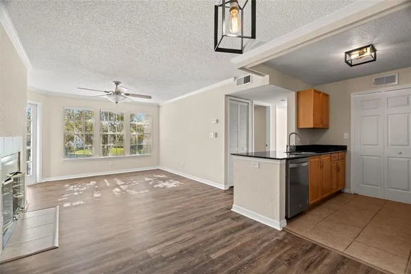 a kitchen with a refrigerator stove and microwave