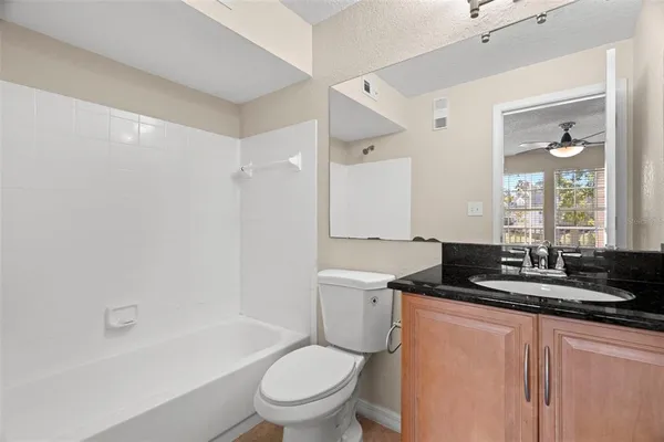 a view of a door and a window