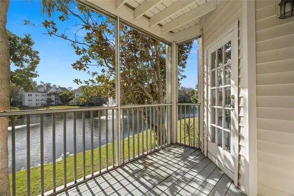a view of a swimming pool with lounge chair