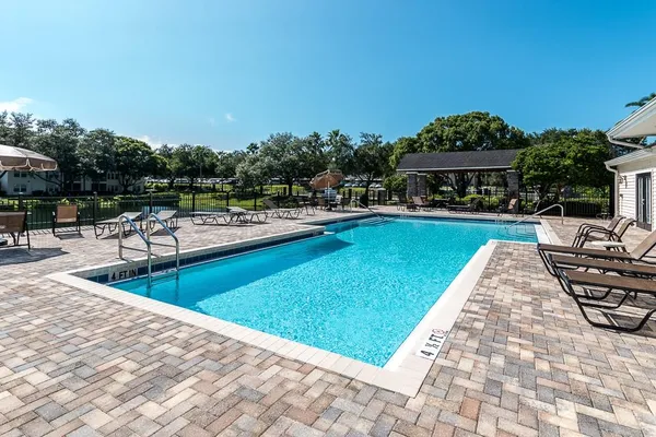 a view of a chairs and a tables in the patio