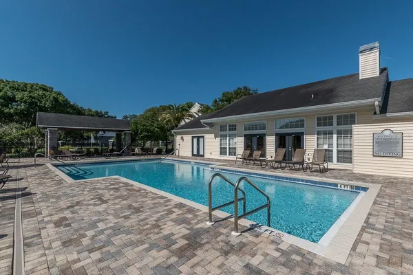 a view of a garden with a house