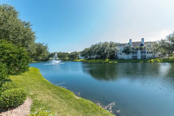 a view of a balcony with two chairs