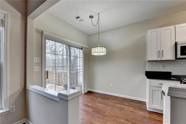 a bathroom with a sink and shower