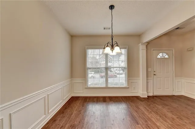 a view of livingroom with hardwood floor and a ceiling fan