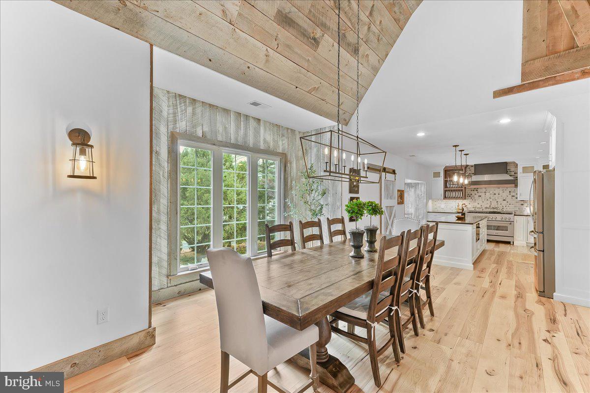 208 Haystack Lane Wilmington, DE 19807 - Photo 18 of 89 a view of a dining room with furniture window and outside view