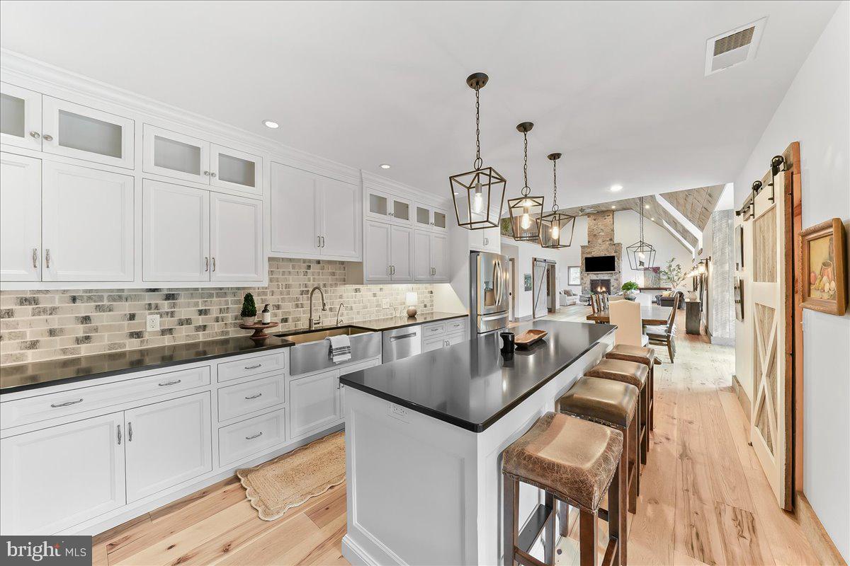 208 Haystack Lane Wilmington, DE 19807 - Photo 20 of 89 a kitchen with stainless steel appliances granite countertop a stove and refrigerator