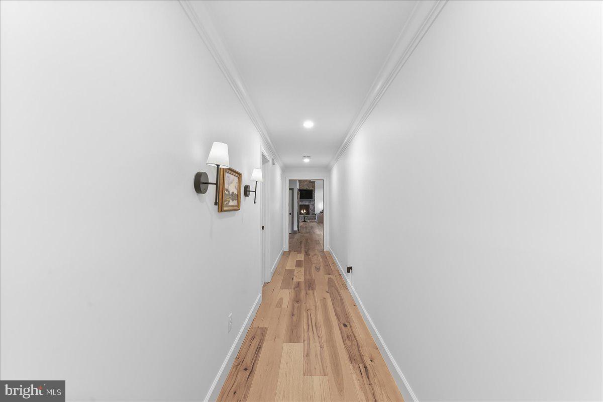 208 Haystack Lane Wilmington, DE 19807 - Photo 25 of 89 a view of a hallway with wooden floor