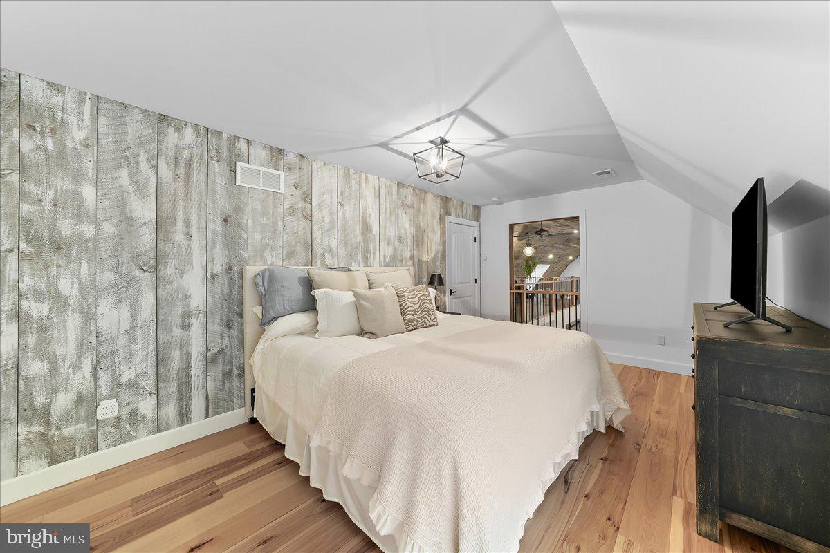 208 Haystack Lane Wilmington, DE 19807 - Photo 35 of 89 a spacious bedroom with a bed and a flat screen tv