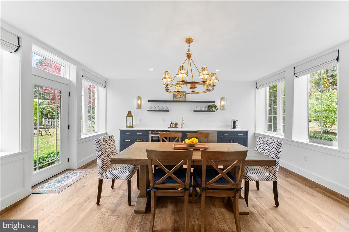 208 Haystack Lane Wilmington, DE 19807 - Photo 44 of 89 a view of a dining room with furniture window and wooden floor