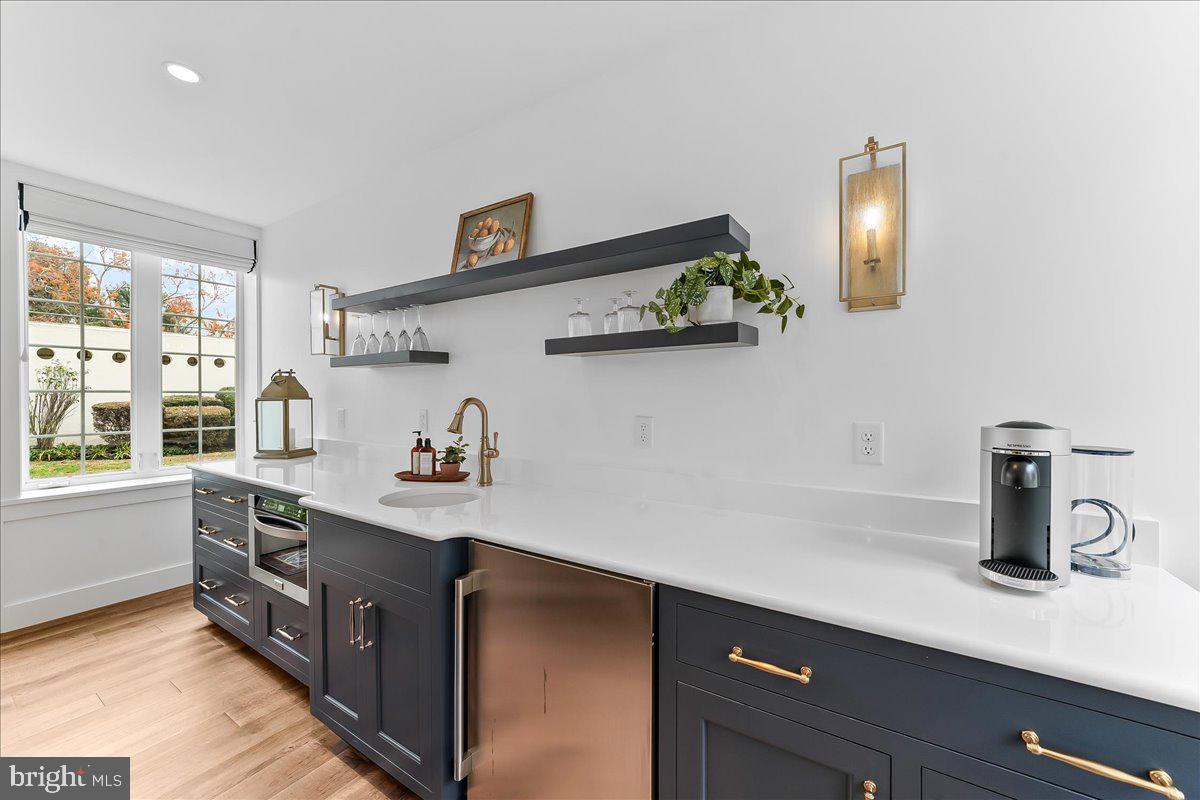 208 Haystack Lane Wilmington, DE 19807 - Photo 45 of 89 a kitchen with a sink and a stove