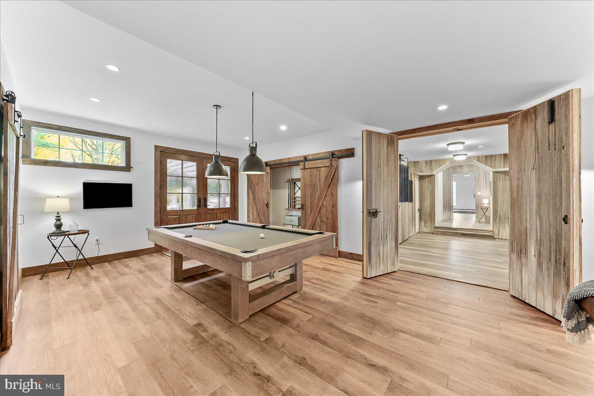 208 Haystack Lane Wilmington, DE 19807 - Photo 48 of 89 a living room with a flat screen tv and a table