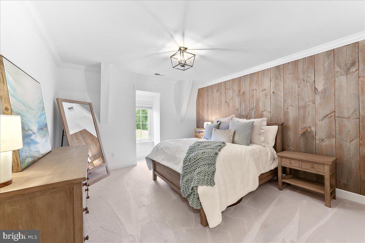 208 Haystack Lane Wilmington, DE 19807 - Photo 61 of 89 a spacious bedroom with a bed and a chandelier