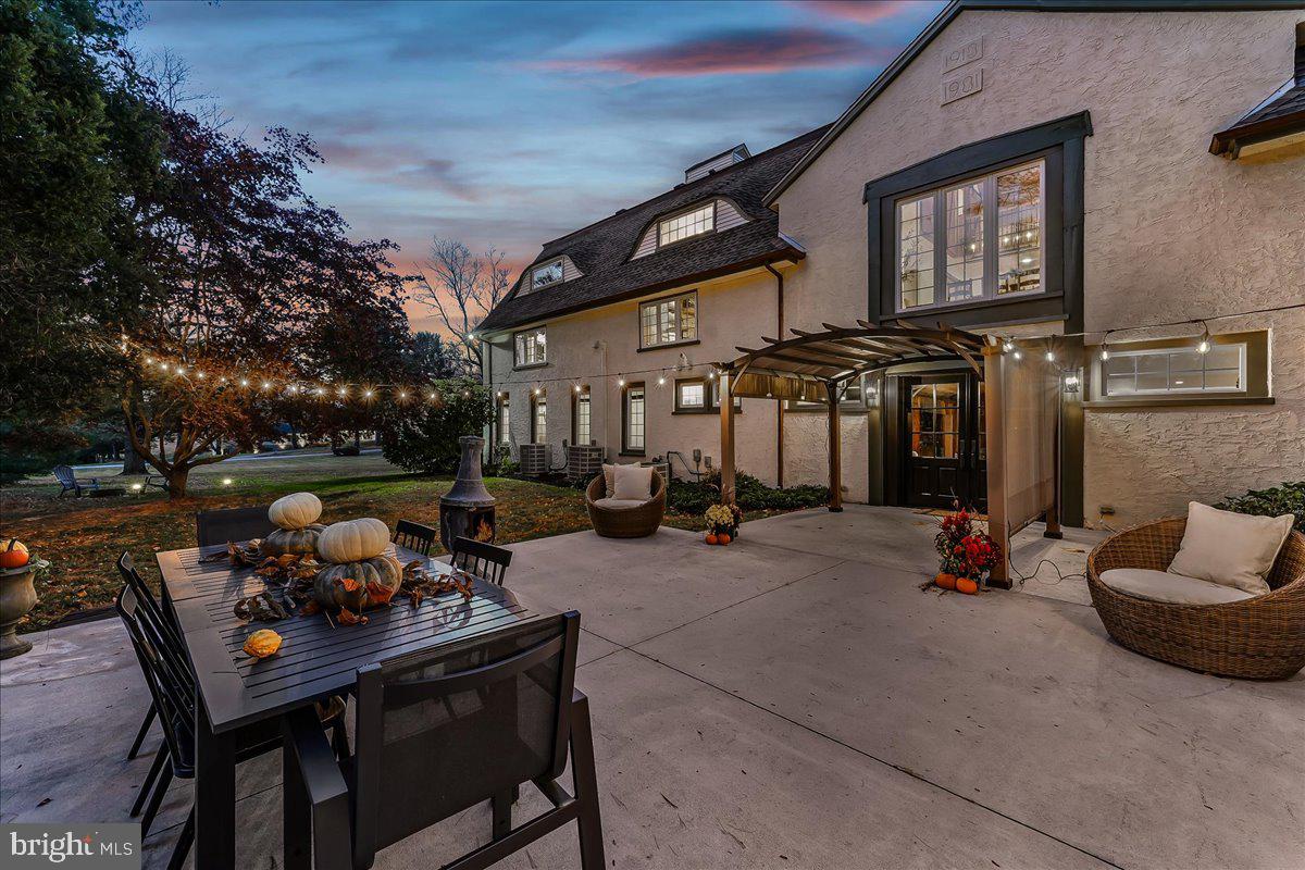 208 Haystack Lane Wilmington, DE 19807 - Photo 78 of 89 a view of a patio with dining table and chairs with wooden fence