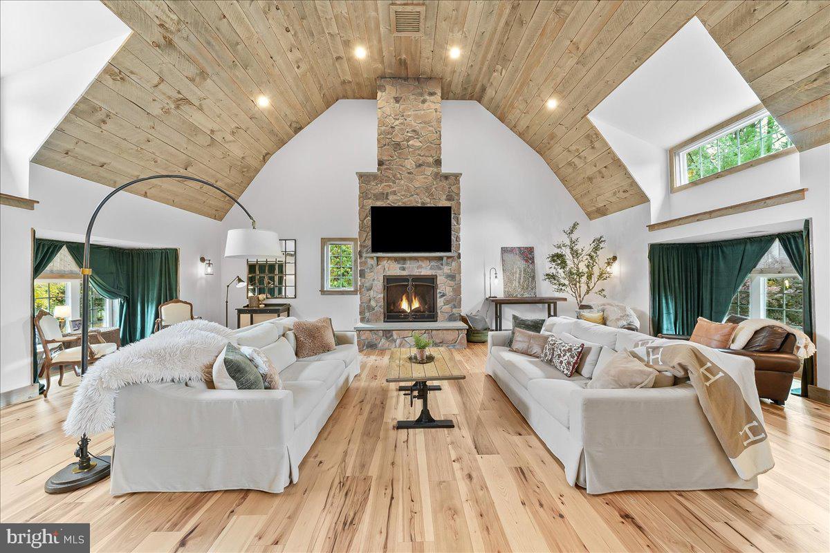 208 Haystack Lane Wilmington, DE 19807 - Photo 9 of 89 a living room with furniture a large window and a fireplace