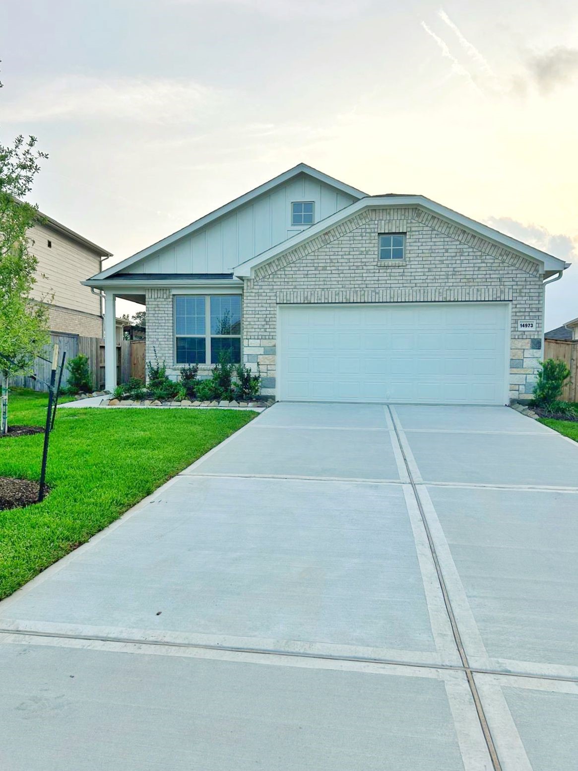 14973 Rustic Moon Road Conroe, TX 77302 - Photo 22 of 22 a front view of house with yard and green space