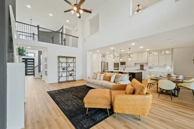 a white toilet sitting next to a bathroom sink