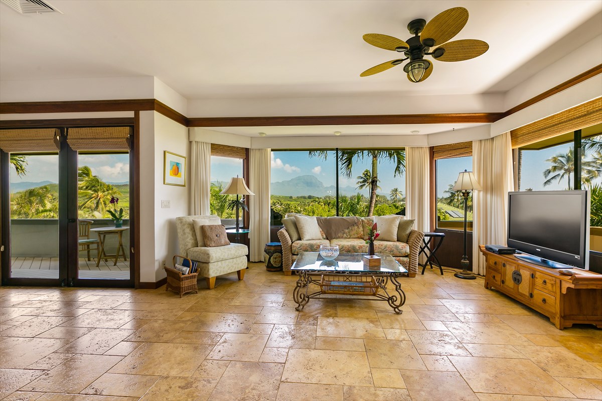 1516 Pe'e Road Koloa, HI 96756 - Photo 5 of 25 a living room with furniture tv and a large window