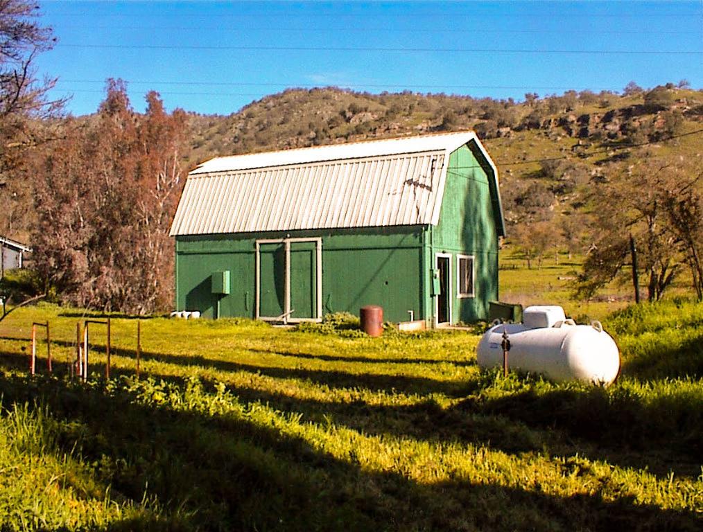 37702 Squaw Valley Road Squaw Valley, CA 93675 - Photo 27 of 42 a view of a house with backyard and patio