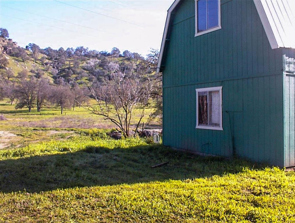 37702 Squaw Valley Road Squaw Valley, CA 93675 - Photo 28 of 42 a view of a house with a yard