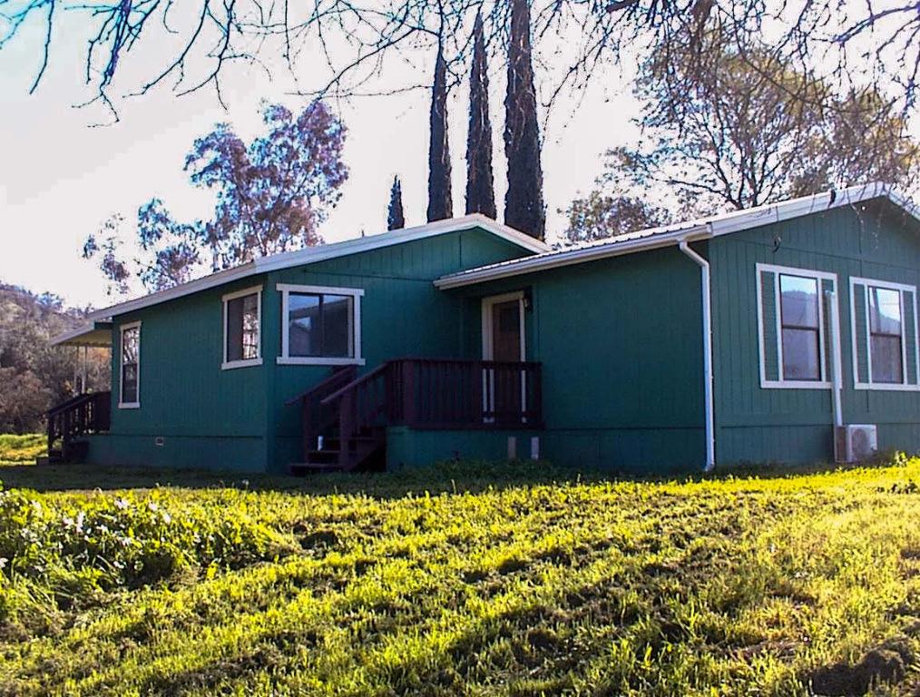 37702 Squaw Valley Road Squaw Valley, CA 93675 - Photo 3 of 42 a view of house with yard