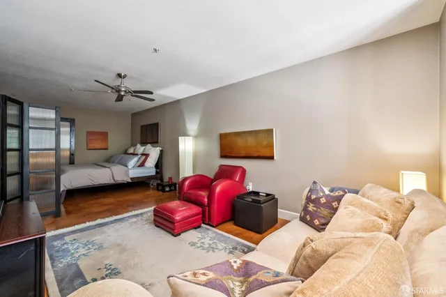 a bedroom with furniture and a couch